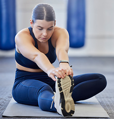 Image showing Fitness, stretching and sports woman at gym for training, exercise and warm up workout for wellness and healthy lifestyle. Athlete woman, sports and stretch for body balance and health in pilates