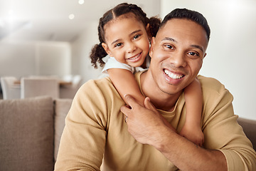 Image showing Love, family and girl relax with father on a sofa, playing, bonding and having fun in a living room. Black family, portrait and child enjoy quality time with parent, smiling, hugging and happy