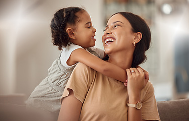 Image showing Happy mama with girl child, hug in home and weekend play time lifestyle for mom parent. Funny crazy kid in living room, mother holding toddler with smile and love bonding together on mothers day