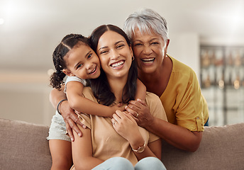 Image showing Grandmother, mom and child hug in a portrait for mothers day on a house sofa as a happy family in Colombia. Smile, mama and elderly woman love hugging young girl or kid and enjoying quality time