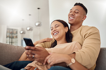 Image showing Phone, happy and couple on a social media meme internet page or website online laughing at funny content. Smile, subscription and young woman loves bonding and streaming comedy with partner at home