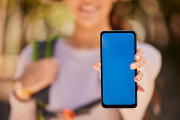 Image showing Phone, green screen and mock up of woman hiking in woods on 5g mobile app, location search or digital marketing. Adventure trekking girl with smartphone mockup screen, background and website branding