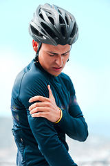 Image showing Sport, injury and arm pain with man cyclist during exercise routine outdoors, fitness, hurt and discomfort. Health, inflammation and sports injury by athletic guy holding shoulder pain after cycling