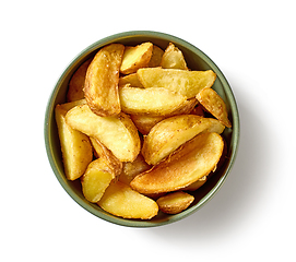 Image showing bowl of fried potato wedges