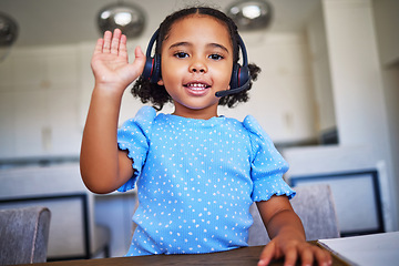 Image showing Elearning, headset and girl child doing an online class waving to greet on an internet video call. Happy, communication and portrait of a kid with distance learning for education with headphones.