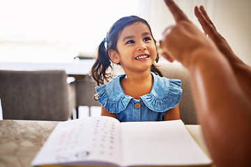 Image showing Education, homeschool and a kindergarten girl with smile, notebook and help from mother in math class. Home school, happy child and learning to count on fingers and hands, woman teaching kid maths.