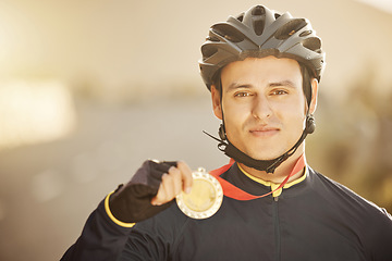 Image showing Cycling, helmet and medal with a sports man after a race as a winner, champion or medalist outside. Motivation, celebration and win with a young male athlete proud of reaching a target or goal