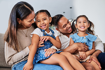 Image showing Love, family and happy kids relax and play with parents on sofa, laughing, cheerful and having fun. Happy family, girls and loving mother and father enjoy quality time with smiling children at home