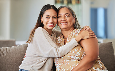 Image showing Woman, happy and hug of a mother and adult child on a home living room lounge couch with love. Portrait of people from Mexico smile on a house sofa with care, happiness and quality time together