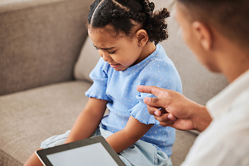 Image showing Stress, sad and crying girl on sofa with angry, frustrated and annoyed father, conflict, argue and guilt. Children behaviour and parent pointing at unhappy kid, distress, upset and living room fight