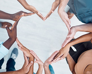 Image showing Teamwork hands, heart and diversity partnership, business people support or community care, motivation and trust. Above group team building for charity, kindness and global solidarity, love and hope