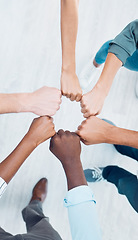 Image showing Team building, fist and circle collaboration, motivation and community, mission goals and company success. Above business people, diversity hands and support, vision and global teamwork partnership