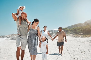 Image showing Travel, summer and big family holding hands at beach and walking on vacation, wellness and support together. Smile, love and relax on sea side holiday with happy parents, children and grandparents