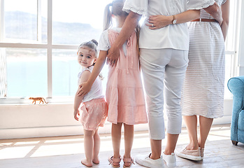 Image showing Women, children and generations, rear view at window, back legs and toddler girl looking with smile. Love, support and happy family together in holiday home in Sydney, Australia on first vacation day