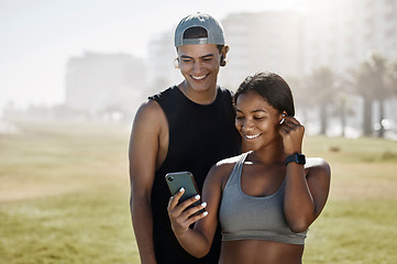 Image showing Black woman, man and music earphones for phone music, radio playlist or health podcast for workout, training and exercise. Smile, happy and bonding sports people or fitness friends with 5g technology