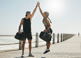 Image showing Motivation, high five and support with couple and fitness training for health, workout and goals in outdoor. Success, winner and partnership with man and woman jump for exercise, wellness and sports