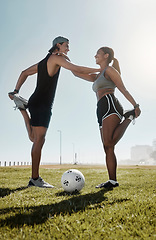 Image showing Exercise, man and woman doing soccer, stretching for game and being healthy on field for wellness, workout and fitness together. Male, female and athlete doing training for health and football