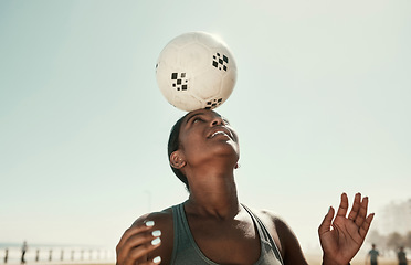 Image showing Head balance, sports and soccer ball with woman athlete in the sun and nature. Fitness, balancing concentration and football exercise of a black person busy with workout, training and healthy cardio