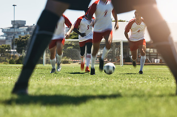 Image showing Soccer, team and running for goal in sports motivation and competitive match or game on the field. Athletic football players in teamwork charging opposing side for victory, score or point outside