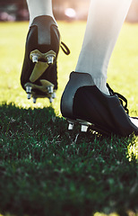 Image showing Soccer shoes, soccer player and soccer field by man for training, exercise and sports game. Football field, feet and football player shoe closeup with athletic guy walking getting ready for match