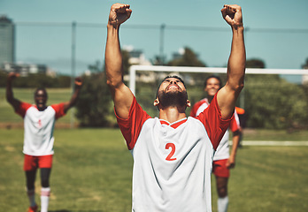 Image showing Soccer, football or team sports for winner, celebration or winning team after scoring goal in match, game or champion. Diverse group of fitness, success and athletic men, man or excited friends