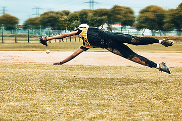 Image showing Baseball, baseball player and jump, ball and catch at a baseball field for training, fitness and exercise. Energy, sport and athletic man jumping, speed and passion at a pitch during competitive game