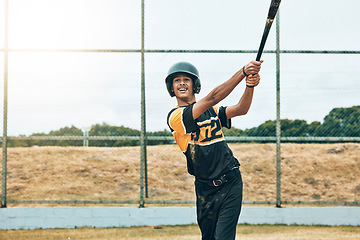 Image showing Baseball batter, baseball and man with bat on field at training, game or competition match. Sports, exercise and young male from India with baseball bat for fitness workout outdoors on grass field.