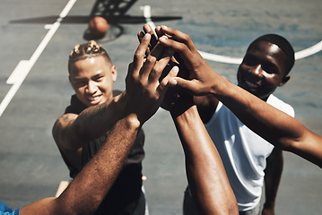 Image showing High five, teamwork and basketball in closeup for support, motivation or match on basketball court. Basketball player, team and smile together for sport, game and success for team building in workout