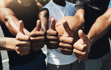 Image showing Basketball men, hands and thumbs up in group outdoor for sports with friends, together or team. Diversity, circle and huddle for teamwork, motivation and fitness on basketball court, training or game