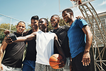 Image showing Selfie, basketball and team on a sports court for partnership, collaboration and training together with a phone. Happy, young and athlete group with a photo on smartphone while doing fitness exercise