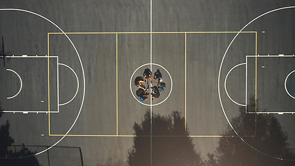 Image showing Top view, basketball court or men in training break circle for game strategy, college match planning or target goal collaboration. Basketball players, sports team or community fitness in workout rest