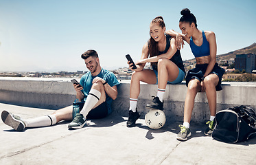 Image showing Sport friends, phone and relax in city after exercise and morning cardio, physical exercise and soccer training. Fitness, soccer player and town hangout with diverse people talking after workout