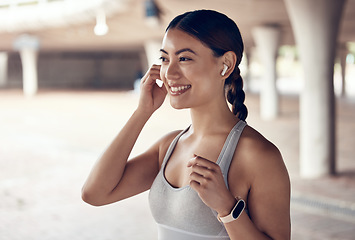 Image showing Music, happy and motivation woman training for fitness with audio podcast in the city of Australia. Face of a latino athlete runner running for cardio exercise while listening to the radio or audio