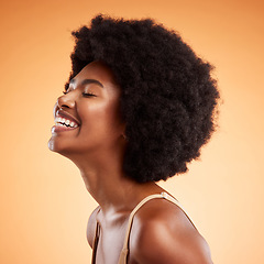 Image showing Beauty, black woman and laughing wellness, skincare and natural makeup, aesthetic glowing skin and clean cosmetics on orange studio background. Smile, happy and young model face, afro hair and funny