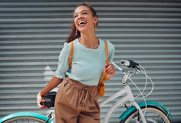 Image showing Bicycle, travel and black woman student excited for outdoor lifestyle, eco friendly cycling transport on garage door background. Gen z girl with bike and backpack on her way to college or university