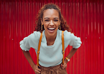 Image showing Woman, happy and freedom fashion, smile and outdoor fun on the weekend alone. Portrait of a young female laugh, fashionable and feeling confident while spending her free time on a red background