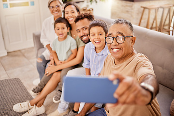 Image showing Grandparents, children and phone selfie while bonding on sofa in house or home living room with social media technology. Smile, happy and mobile photography for kids, parents and seniors grandparents