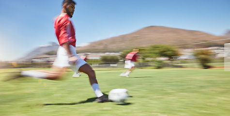 Image showing Action, soccer player and man kick soccer ball on grass pitch, sports competition and team game, goals and winning score. Motion blur football field athlete, running action or outdoor training energy