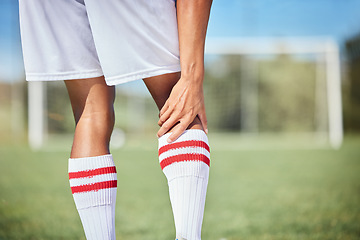 Image showing Sports, soccer player and man with knee injury, torn muscle or strain after game, competition or fitness practice. Exercise, grass pitch workout or football training accident for athlete legs in pain