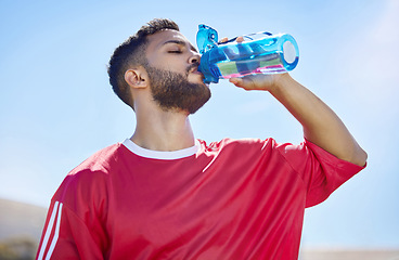 Image showing Sports, fitness and drinking water with man in sunshine and blue sky mock up for outdoor wellness, training and healthy lifestyle. Tired athlete with water bottle for workout, exercise or practice
