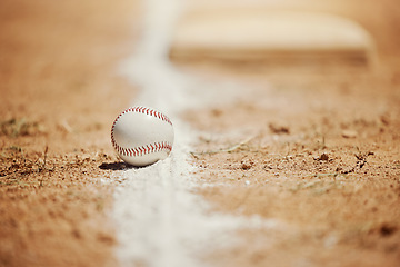 Image showing Baseball, chalk line and ball on field before sports game, training and practice. Competition, motivation and sport equipment on baseball field ground. Isolated, close up and copy space for softball