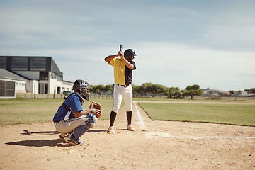 Image showing Baseball player, baseball team and man with bat on baseball field ready for training game, competition or match. Fitness, teamwork and baseball batter with team for sports workout outdoors on pitch.