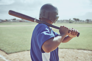 Image showing Baseball, baseball batter and back view of black man on field ready to hit ball during match, game or competition. Sports, fitness and baseball player on grass field outdoor for training or exercise.