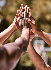 Image showing Team, basketball and hands doing high five after success, winning and goal in sports game. Diversity, teamwork and celebration in training, practice and match, motivation to win on basketball court