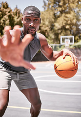 Image showing Portrait, sport and basketball black man on court in training, practice or game. Health, exercise and workout male athlete showing off skills, exercise for sports competition or tournament outdoor