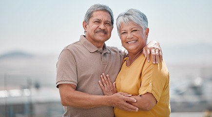 Image showing Couple, happy and outdoor portrait of senior love on retirement vacation in a city bonding and hugging with smile and care. Happiness, support and elderly man and woman being romantic in Puerto Rico