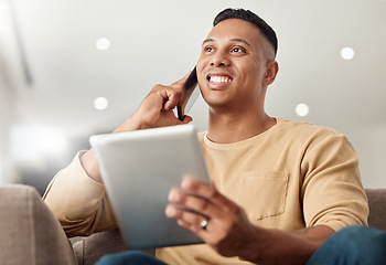 Image showing Phone call, tablet and man networking, speaking and working on the internet from the sofa in his house. Happy, thinking and young freelancer speaking on a mobile with a search on the internet on tech