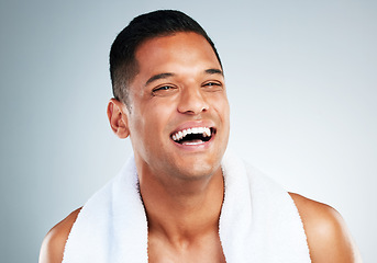 Image showing Happy, laugh and face of man clean after wellness wash, facial cleaning routine and skincare mockup. Happiness, smile and person with bath shower towel for body self care isolated on gray background