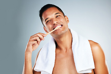 Image showing Dental, health and man use toothbrush and toothpaste to clean teeth for healthy mouth, gums and happy. Confident, male and relax shows oral hygiene with big smile, cleaning and brushing teeth