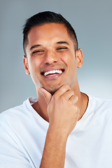 Image showing Man, portrait and smile with teeth in fresh or clean hygiene against a grey studio background. Happy male smiling for healthy lifestyle in satisfaction for dental, mouth and oral or gum care